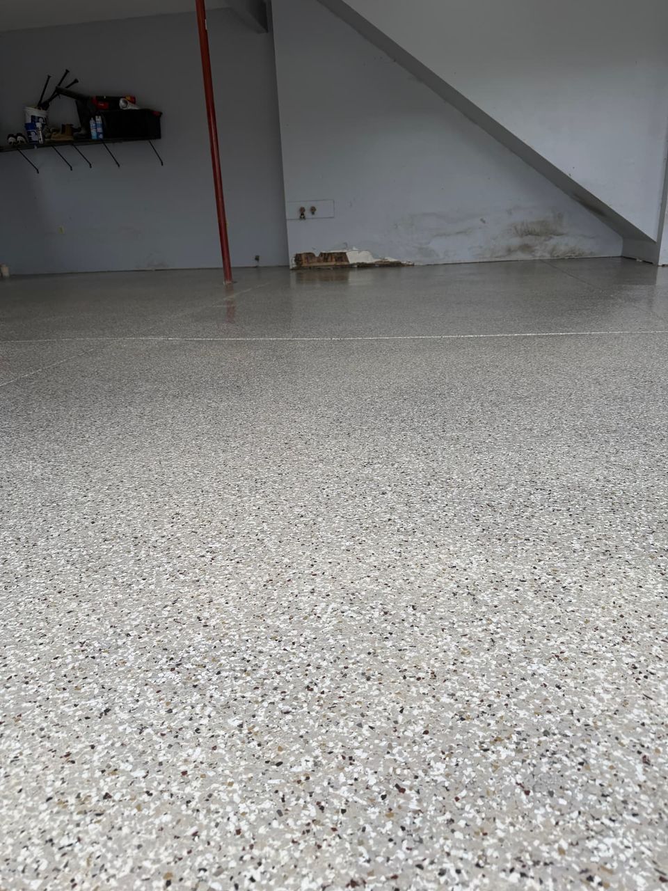 Light flake epoxy garage floor by SurfaceKings